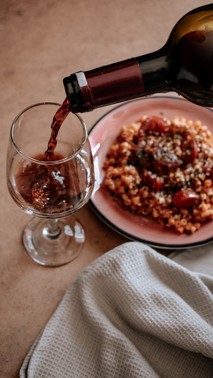 Clear Wine Glass on Table